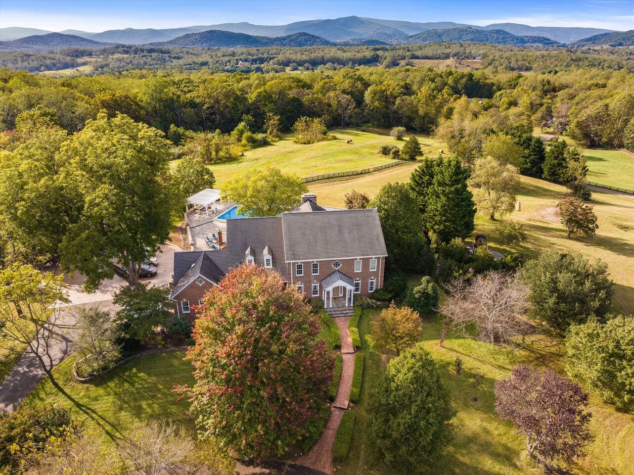 Aerial view of Mountain Mama Ranch with Blue Ridge mountains beyond